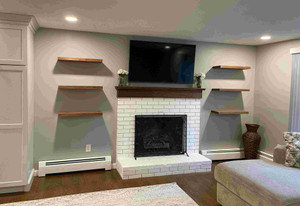 Creating an Organized and Stylish Basement Entertainment Area with Floating Shelves