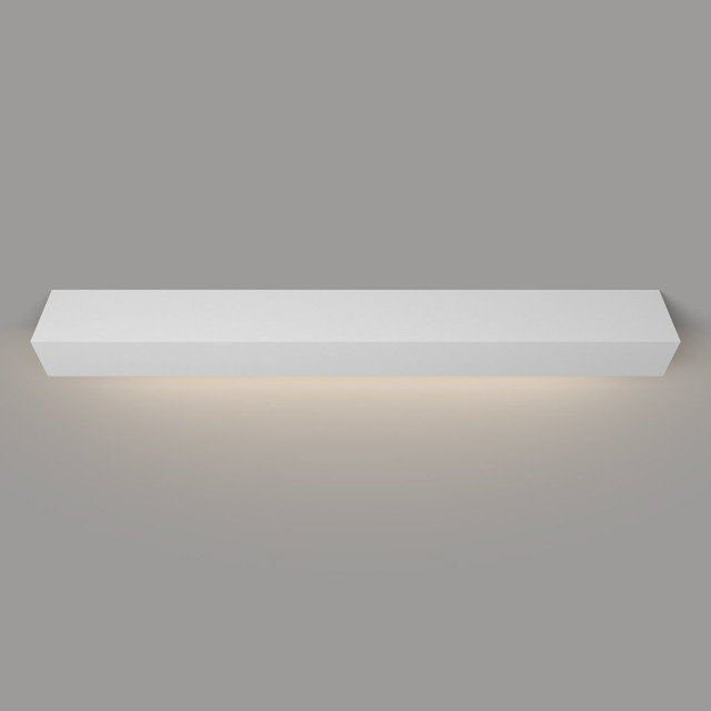 Angled view of a white painted floating mantel shelf with LED lighting, mounted on a wall and showcasing sleek design with ambient light beneath.