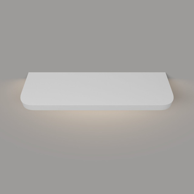 Top-down view of a white painted floating shelf with integrated lighting and gently rounded radius front corners, highlighting the smooth finish and depth.