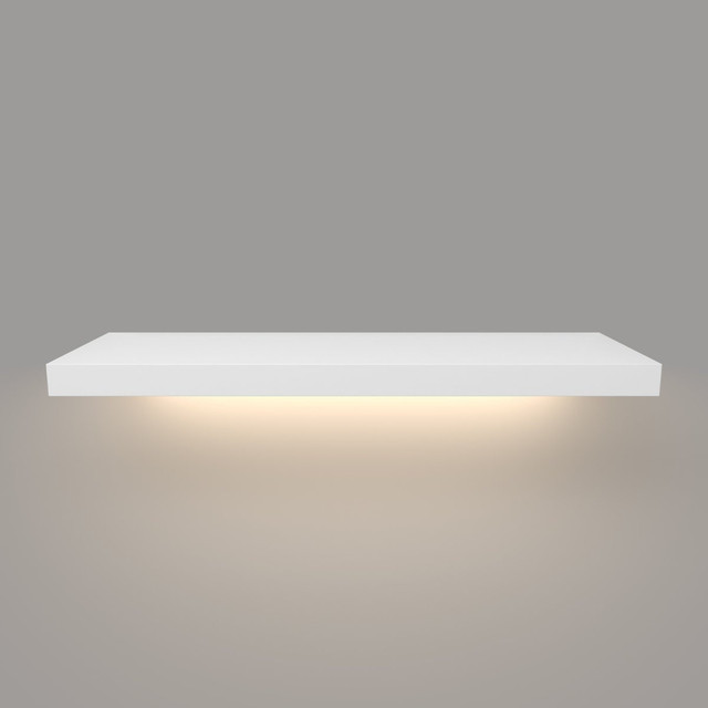 Front view of painted white floating shelf with integrated hardwired LED light – 1 5/8 inch thick solid wood design by J Thomas Home. Front view of painted white floating shelf with integrated hardwired LED light – 1 5/8 inch thick solid wood design by J Thomas Home.