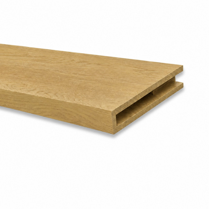 Close-up of white oak alcove floating shelf showing natural oak grain, the open end, and recessed hidden cleat channel.