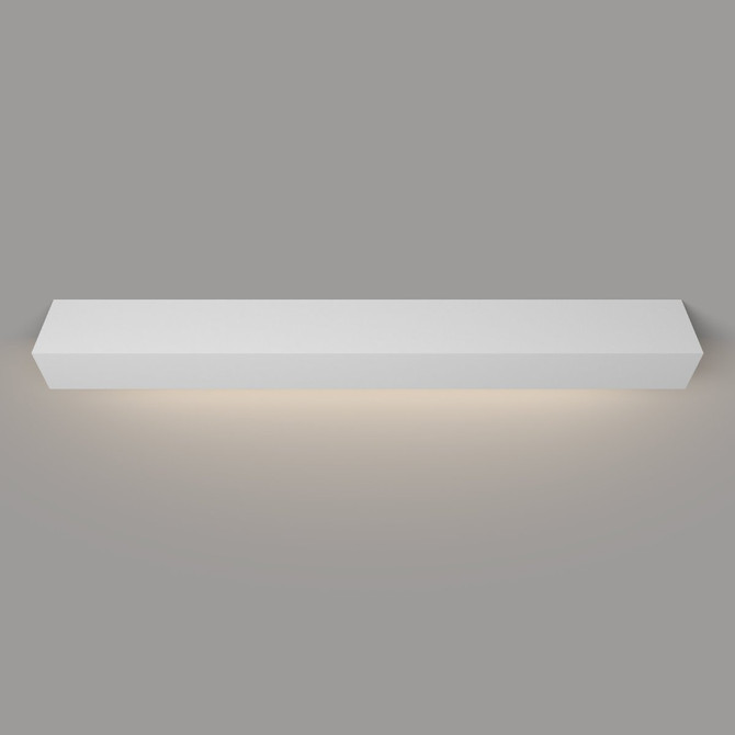 Angled view of a white painted floating mantel shelf with LED lighting, mounted on a wall and showcasing sleek design with ambient light beneath.