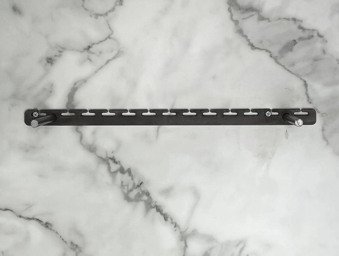 Heavy-duty metal bracket included with the LED-lit white floating shelf, designed for secure wall mounting and hidden support within the 1.625-inch shelf.