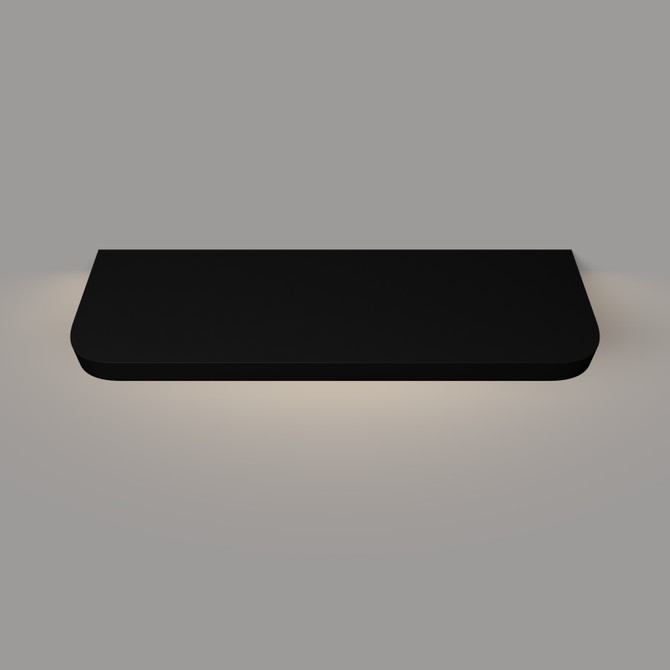 Top-down view of a black painted floating shelf with integrated lighting and gently rounded radius front corners, highlighting the smooth finish and depth.