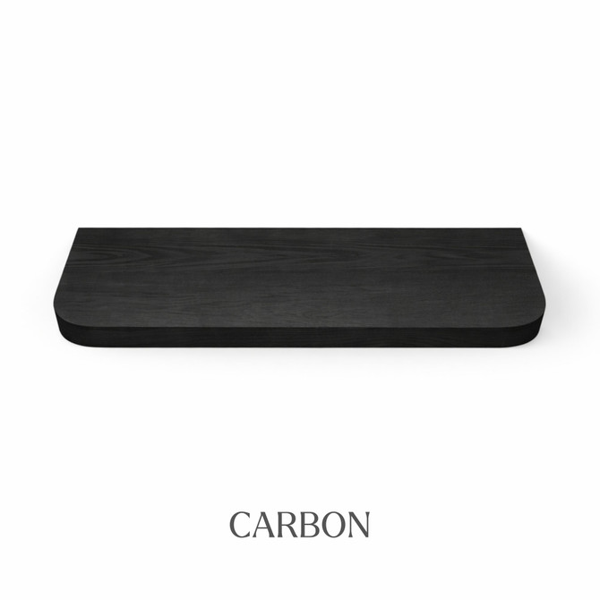 Top view of a radius-corner red oak floating shelf, finished in carbon, showing near-black tones with visible wood grain detail.
