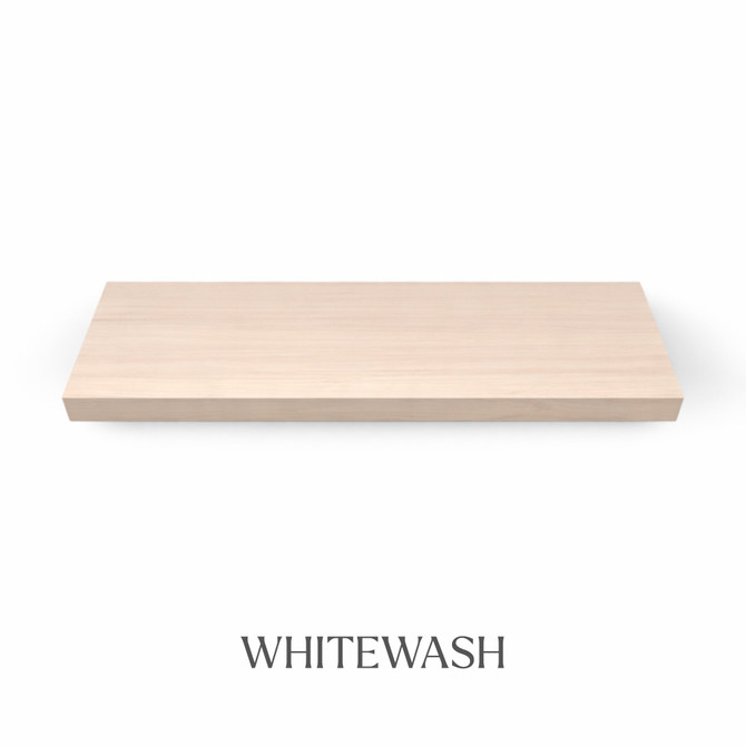 Top view of a 1 5/8-inch thick solid red oak floating shelf with battery-powered LED lighting, finished in whitewash, showing subtle grain and light color variation.