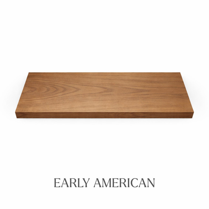 Top view of a 1 5/8-inch thick solid red oak floating shelf with battery-powered LED lighting, finished in Early American stain, showing warm brown tones and visible grain.