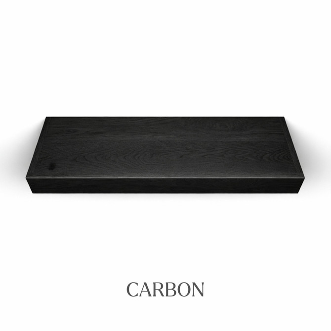 Top view of a 3-inch thick red oak floating shelf with battery-powered LED lighting, finished in carbon, showing near-black tones with visible wood grain detail.