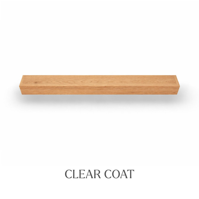 Top view of a 5-inch thick red oak floating mantel finished with clear coat, showing natural grain and color variation.