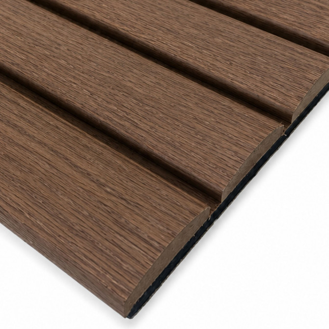 Detailed close-up of Tawny Reeded acoustic wall panel highlighting the natural wood grain and rounded reeded profile.