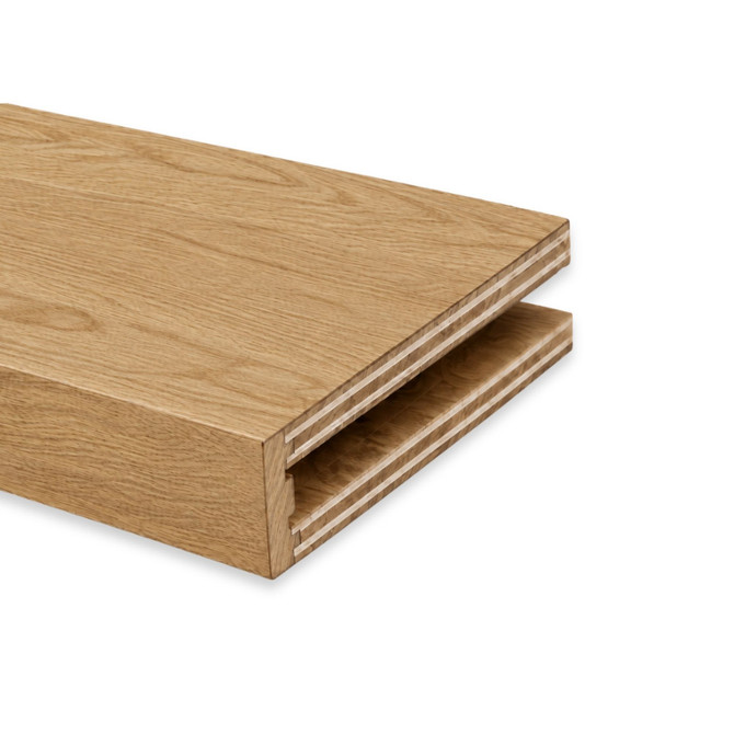 Close-up of a 3-inch White Oak alcove floating shelf in Clear Coat showing the open end and routed channel for side cleat installation.