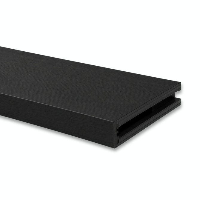 Close-up of a 2-inch Maple alcove floating shelf in Painted Black showing the open end and routed channel for side cleat installation.