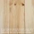 Natural pine wood boards showing light color variation, visible grain patterns, and knots found across real wood lumber.