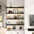 1.625-inch thick black floating shelves featuring built-in LED lighting for subtle under-shelf illumination. The slim profile and warm under-shelf glow create dramatic contrast against light walls, adding depth, ambiance, and architectural sophistication.