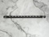 Heavy-duty metal bracket included with the LED-lit white floating shelf, designed for secure wall mounting and hidden support within the 1.625-inch shelf.