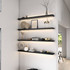 1.625-inch thick black floating shelves with radius edges and built-in LED illumination. The rich finish grounds the space as the soft lighting highlights décor and enhances visual dimension with contemporary sophistication.
