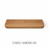 Top view of a radius-corner red oak floating shelf, finished in Early American stain, showing warm brown tones and visible grain detail.
