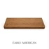 Top view of a 2-inch thick red oak floating shelf with battery-powered LED lighting, finished in Early American stain, showing warm brown tones and visible grain detail.