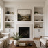 2-inch Painted White Maple alcove floating shelves installed in built-in niches surrounding a living room fireplace.