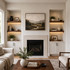 2-inch Walnut LED-lit alcove shelves installed in built-in niches beside a living room fireplace.