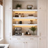 3-inch White Painted Maple LED-lit alcove shelves installed in a built-in kitchen coffee bar with recessed under-shelf lighting.