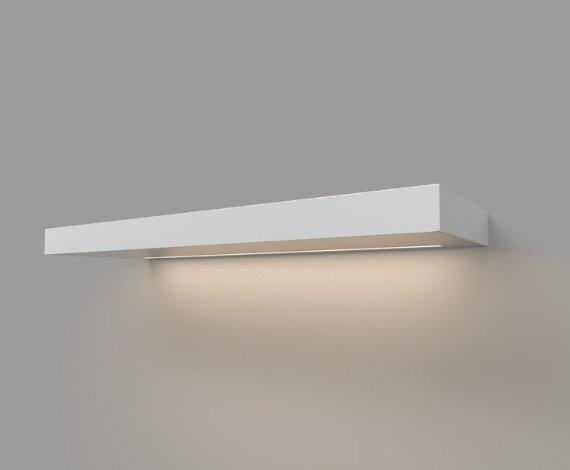 White LED floating shelf, 2 inches thick, with soft built-in down lighting illuminating the wall below