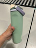 OWALA 30OZ FREE SIP STAINLESS STEEL WATER BOTTLE LIGHT GREEN WITH TAN TOP OF LID