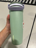OWALA 30OZ FREE SIP STAINLESS STEEL WATER BOTTLE LIGHT GREEN WITH TAN TOP OF LID