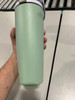 OWALA 30OZ FREE SIP STAINLESS STEEL WATER BOTTLE LIGHT GREEN WITH TAN TOP OF LID
