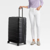 OPEN STORY HARDSIDE LARGE CHECKED SPINNER SUITCASE - BLACK