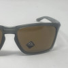 OAKLEY SYLAS MEN'S SUNGLASSES - GRAY FRAME, BROWN LENS/OAKLEY LOGO 57-17-142