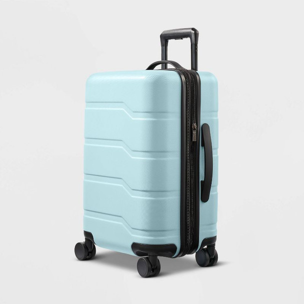 OPEN STORY HARDSIDE CARRY ON SPINNER SUITCASE - MUDDY AQUA