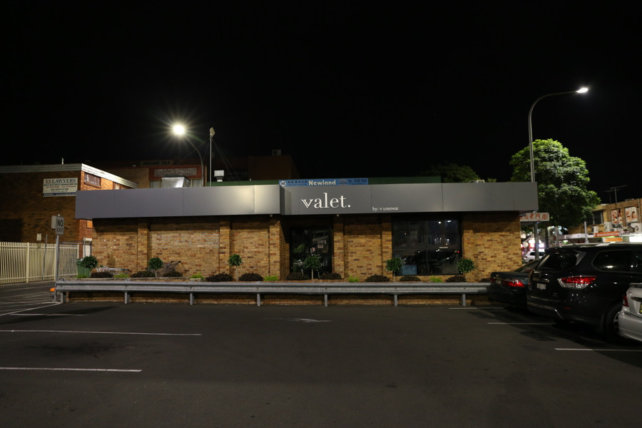 Cladded Building Awning with 3D Sign