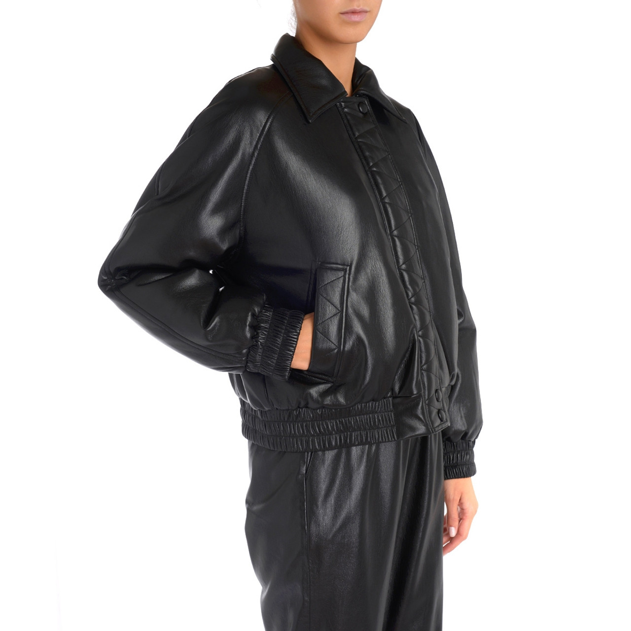 Jacket over Anine Bing black faux leather H Brands