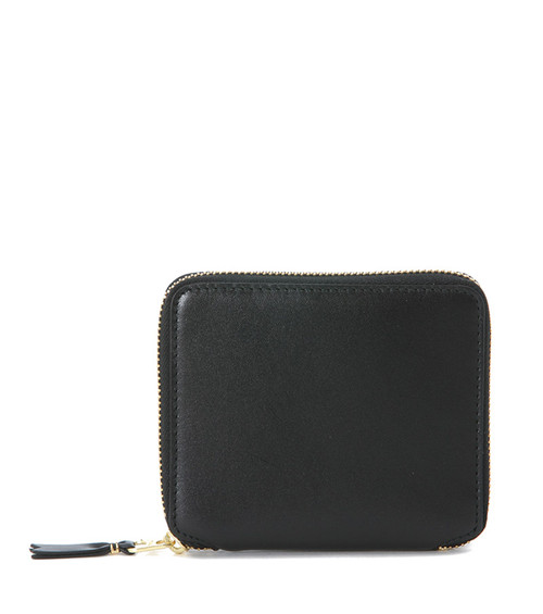 Comme des Garçons wallet in black leather with U-shaped closure