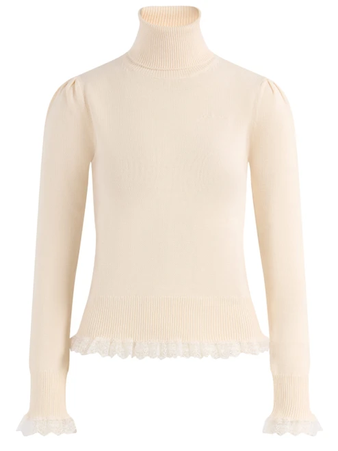 Maglia dolcevita Ganni in lana ecrù 