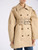 Trench Ganni in cotone color sabbia