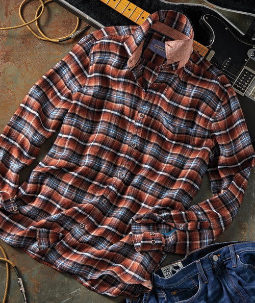 32 Bar Blues Goody Good Good Stuff, plaid flannel shirt with button-down collar and long sleeves, laid flat on the surface with a guitar and other musical equipment nearby.