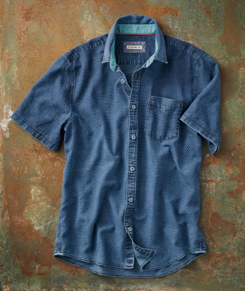 32 Bar Blues To The Point, Short-sleeve button-up denim shirt with chest pocket on rustic background.