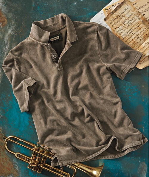 Product 32 Bar Blues Sunday, Monday or Always, vintage grey polo shirt with music sheets and a trumpet on a distressed blue surface.
