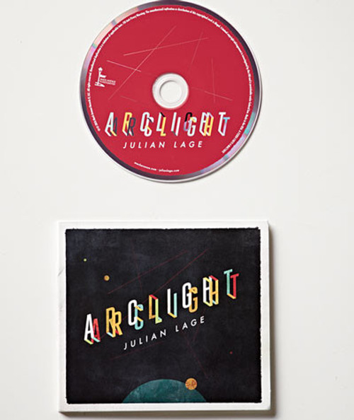 32 Bar Blues Julian Lage - Arclight, CD and album cover showing colorful text on a space-themed background.