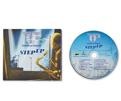 32 Bar Blues Tower Of Power - Step Up, CD and album cover featuring a-tone blue background with the Tower of Power logo, and a jazz band performing on stage.