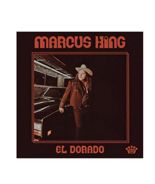 32 Bar Blues Marcus King - El Dorado, album cover featuring Marcus King in a cowboy hat standing next to a car at night with a city backdrop, bold red text.