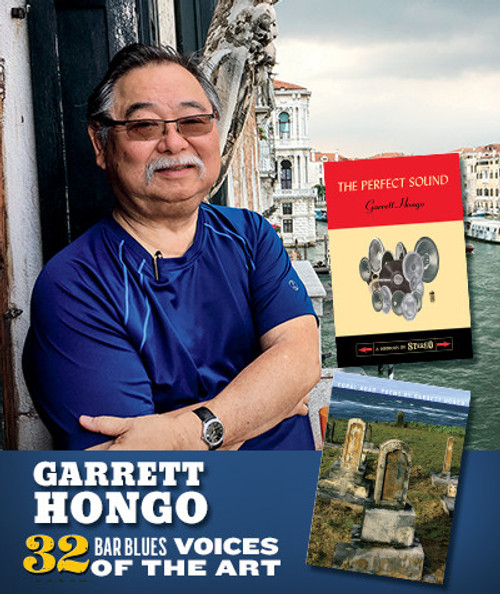 32 Bar Blues Garrett Hongo - Coral Road, a man in a blue shirt standing outdoors near water with a cityscape in the background, holding a book titled 'Voices of the Art'.