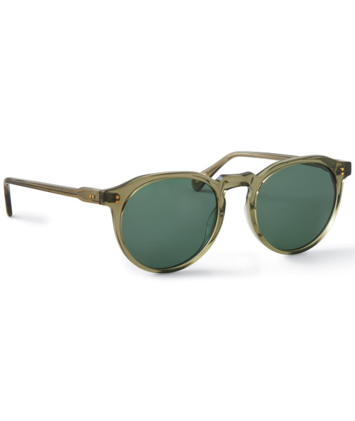 32 Bar Blues Dimming Of The Day sunglasses, stylish round frame sunglasses with green tinted lenses and a transparent khaki-colored frame.