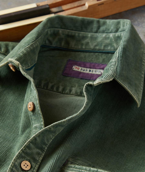 32 Bar Blues Sidekick, green corduroy shirt with button closure and collar.
