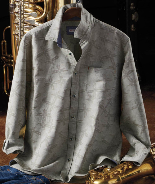 32 Bar Blues Jazzmatazz, stylish men's grey patterned dress shirt with a tool and brass instrument in the background.
