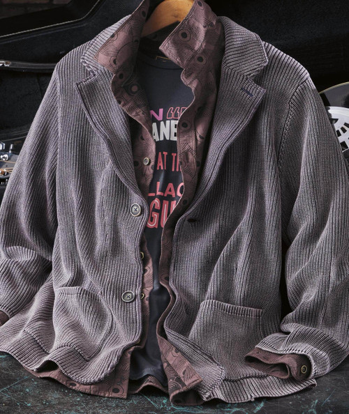 Dexter Digs In, vintage brown and gray striped blazer layered over a graphic black T-shirt with pink and white text, casual stylish fashion outfit.