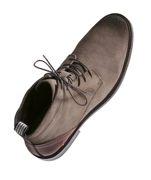 Back Burner, a men's brown suede dress shoe with lace-up closure and a sleek rounded toe, featuring a black rubber sole with white stitching detail.