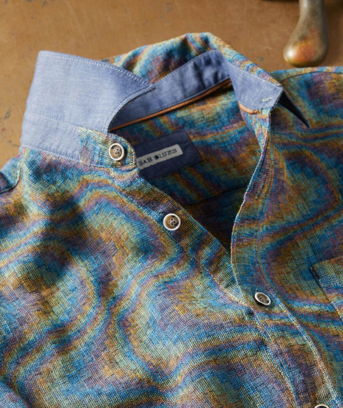 Celestial Soul, colorful woven fabric shirt with a unique pattern and contrasting collar detail.